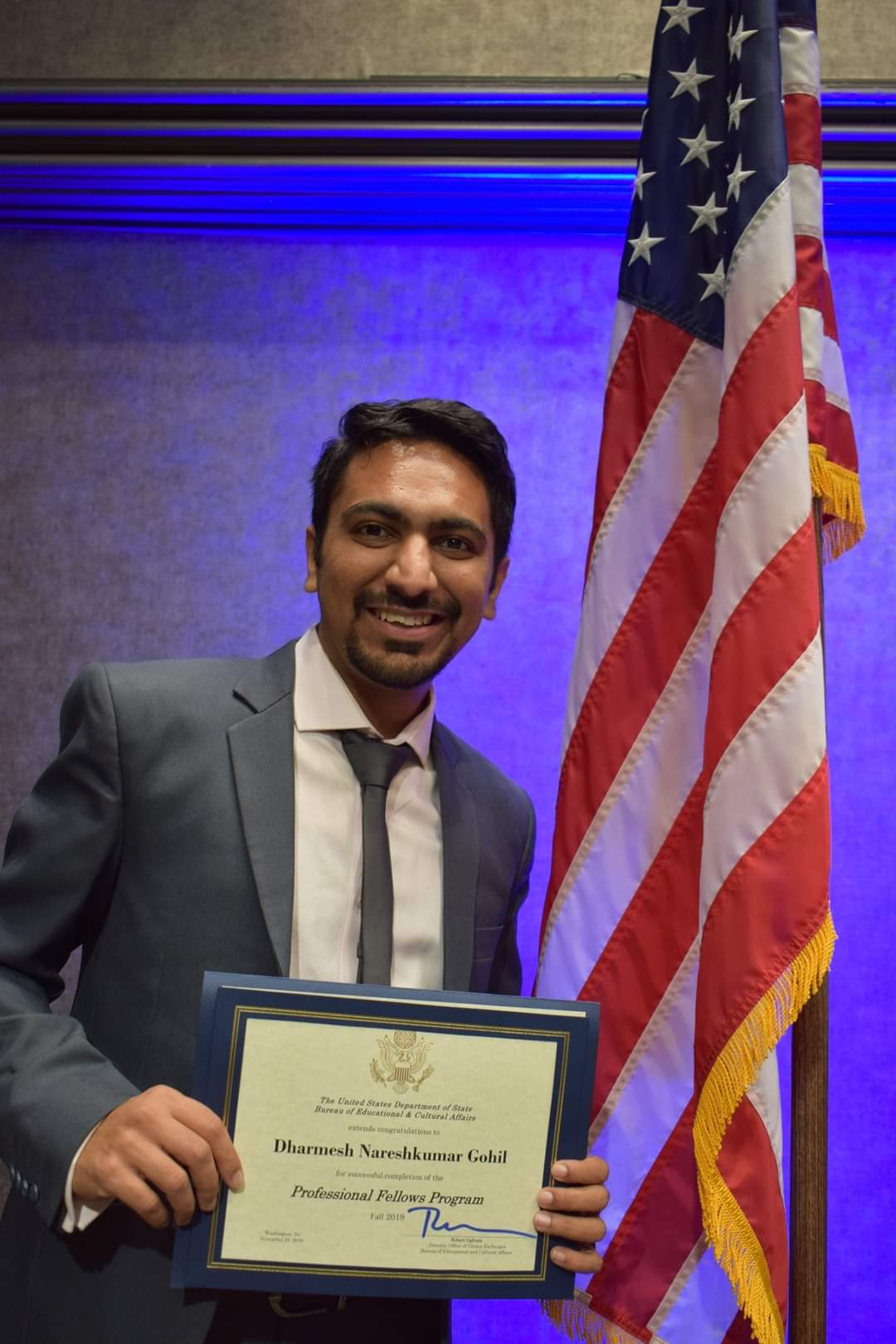 Dharmesh Gohil receiving certification from the U.S. Department of State, Professional Fellows Program, Fall 2019.